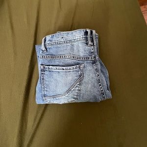 distressed ripped 30" blue jeans
